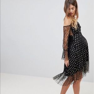 Size 4 maternity dress. Worn one time from ASOS